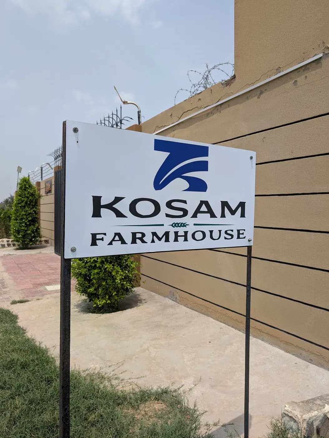Kosam Farmhouse entrance signboard