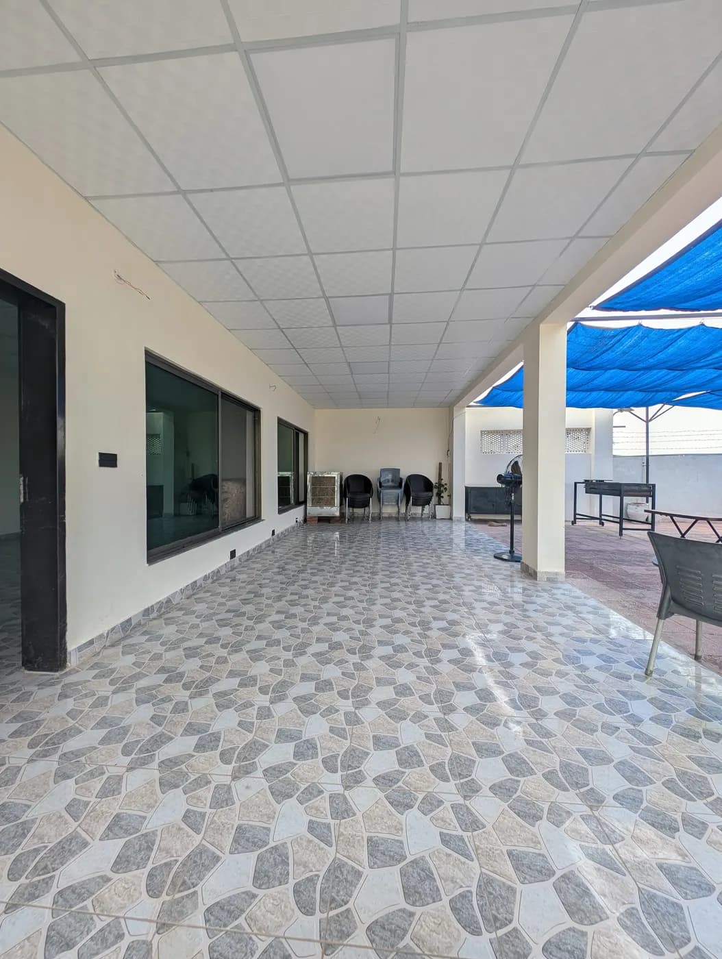 Kosam Farms covered veranda corridor